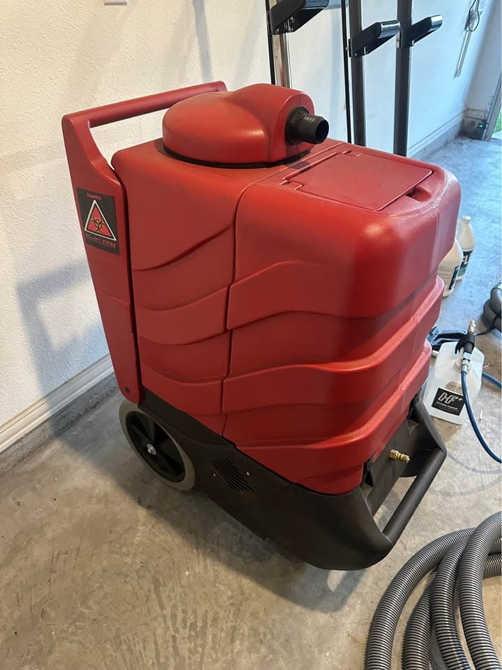 Close-up of a professional carpet cleaning extraction machine